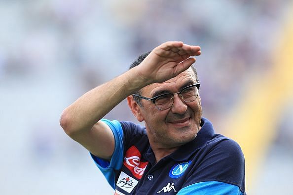 Napoli's Italian coach Maurizio Sarri greets supporers...